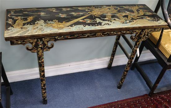 A Chinese lacquered altar table W.120cm